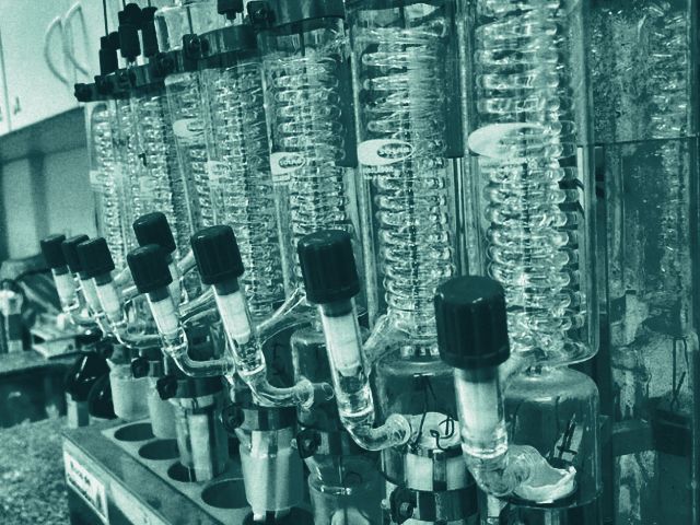 Glass condensers on a lab bench
